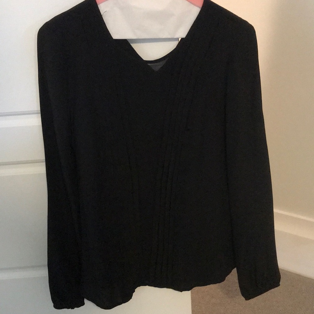 Silk black blouse with sheer cut in middle